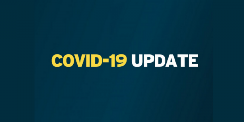 Covid 19 update written on blue